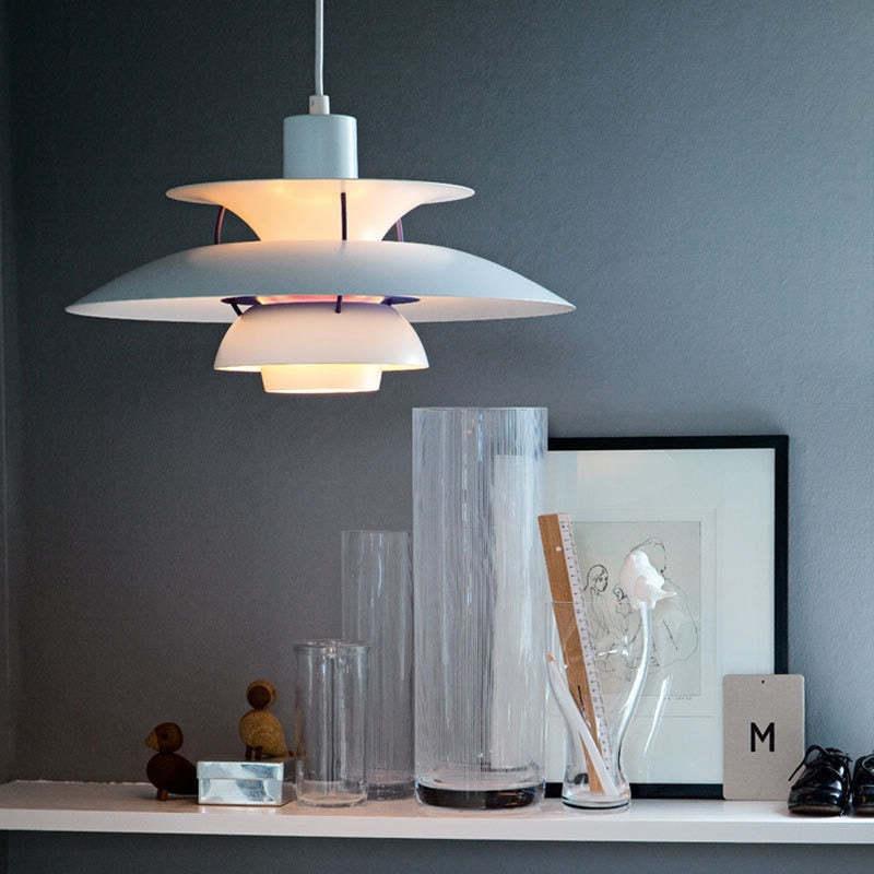 Grey layered pendant with warm glow