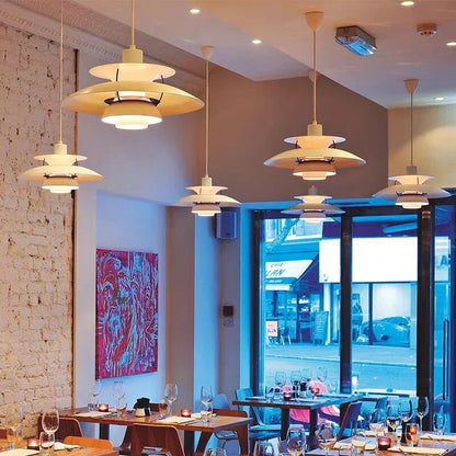 Layered pendant lights in a restaurant