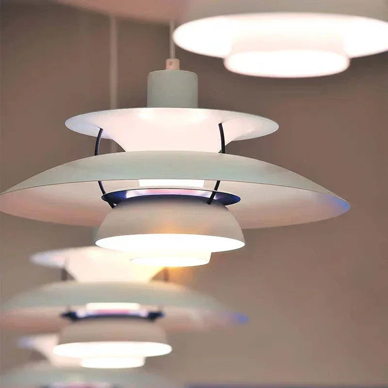 Close view of layered metal pendant shades