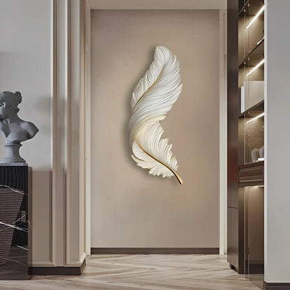 Vertical white feather-shaped LED wall lamp mounted on a beige hallway wall, providing elegant ambient lighting for a modern interior design scheme.