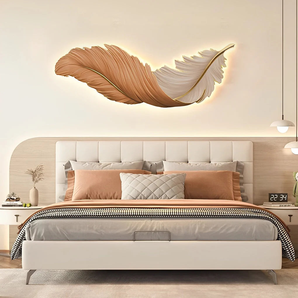 Horizontal orange and white LED feather wall lamp mounted above a modern bedroom headboard, providing soft ambient lighting for a stylish interior.