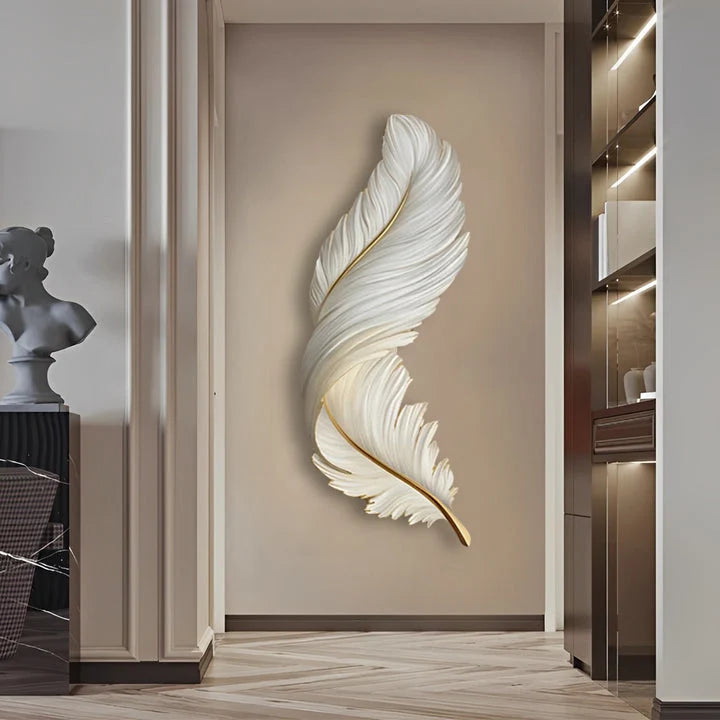 A vertical white LED feather wall lamp mounted in a modern hallway, featuring a detailed textured design with gold accents for elegant ambient lighting.
