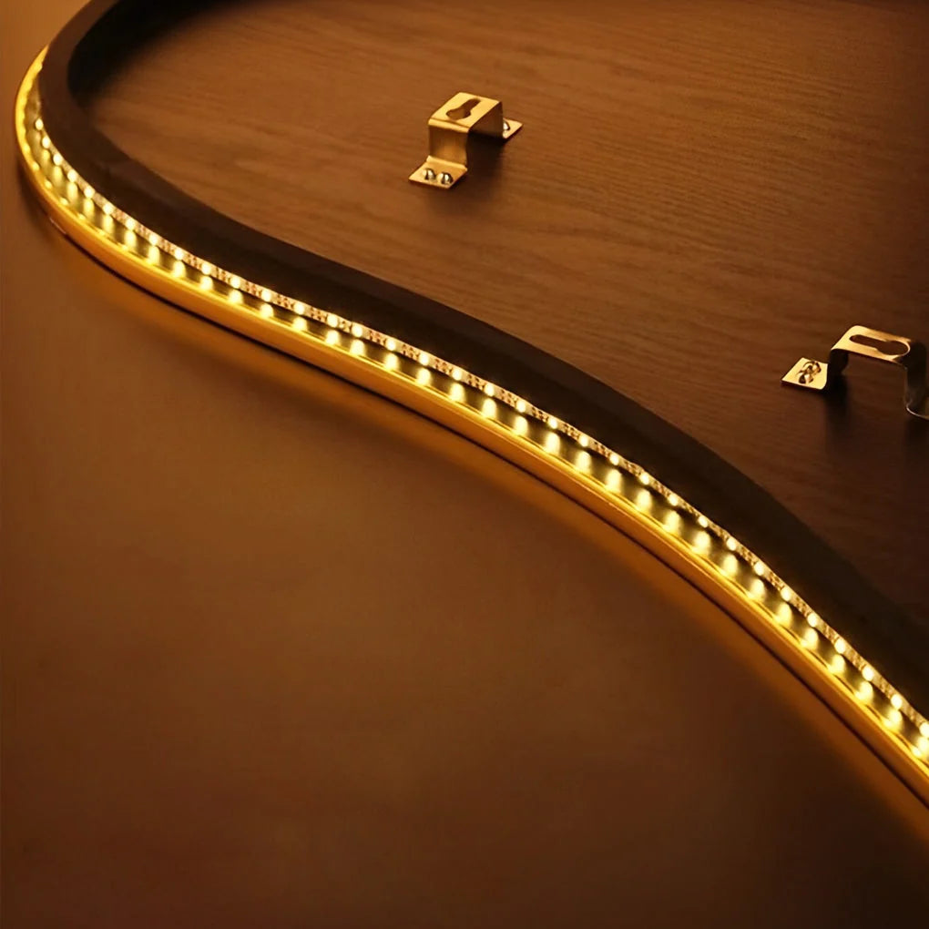 Close-up view of the back of a curved LED wall lamp showing the integrated light strip, wooden frame, and metal mounting brackets for wall installation.