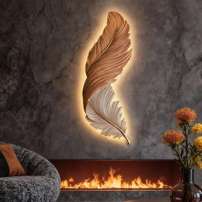 A feather-shaped LED wall lamp with warm backlighting, featuring a brown and white design, mounted on a dark textured wall above a modern fireplace.