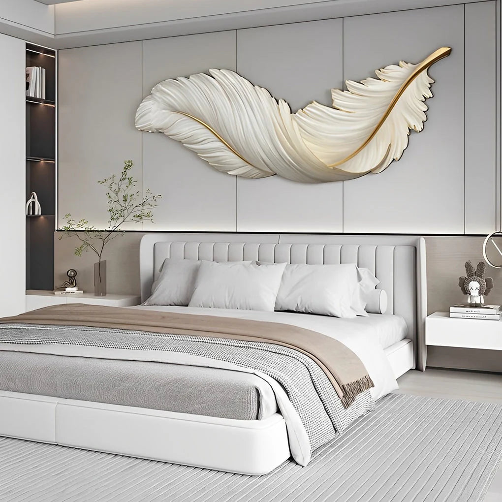 A large, horizontal white LED feather wall lamp mounted above a modern bedroom bed, providing elegant ambient lighting in a contemporary interior.