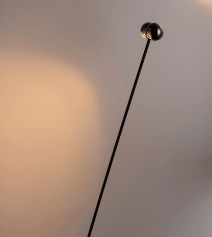 Angled view of the black chrome heads and slim stem