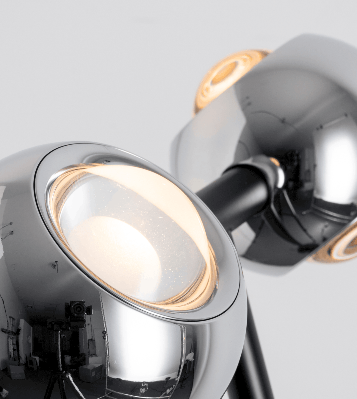 Close-up of the adjustable chrome LED lamp heads