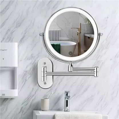Silver LED magnifying wall mirror with an extending arm in a bathroom