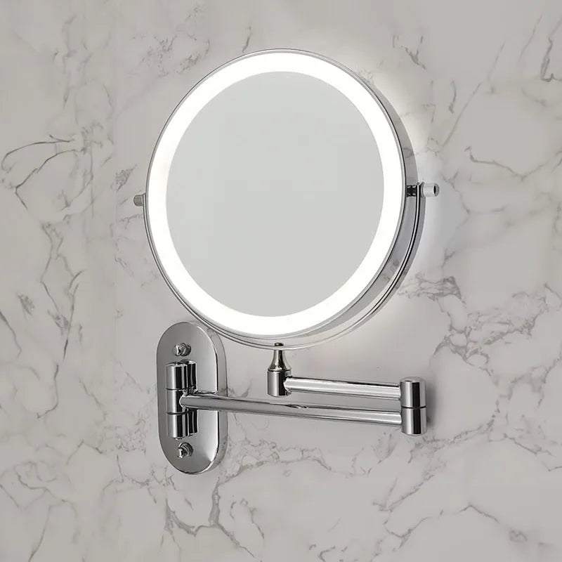 Silver LED wall mirror with a lit ring and swivel arm