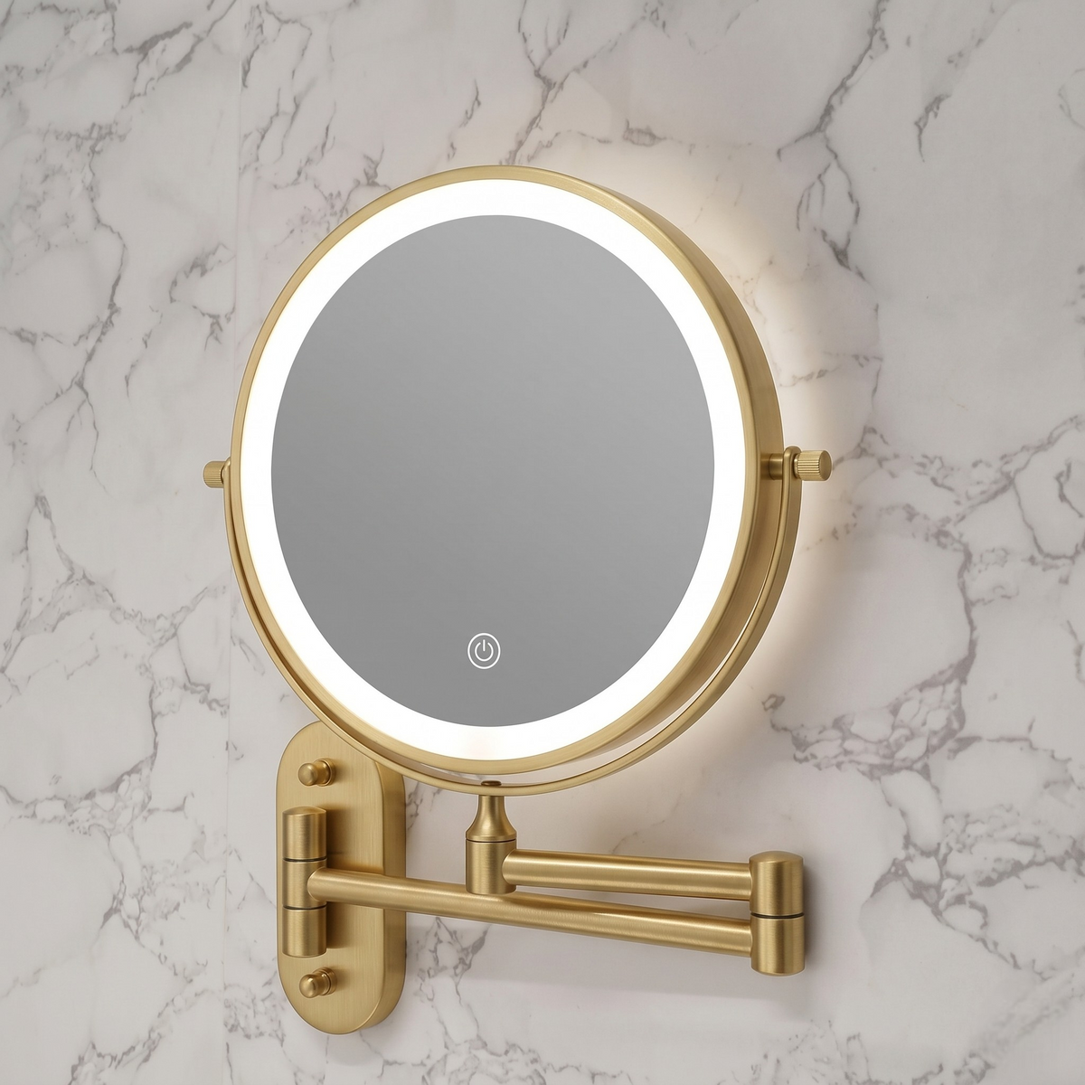 Gold LED magnifying wall mirror mounted beside a basin
