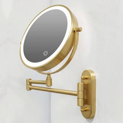 Gold LED magnifying wall mirror on an extending arm