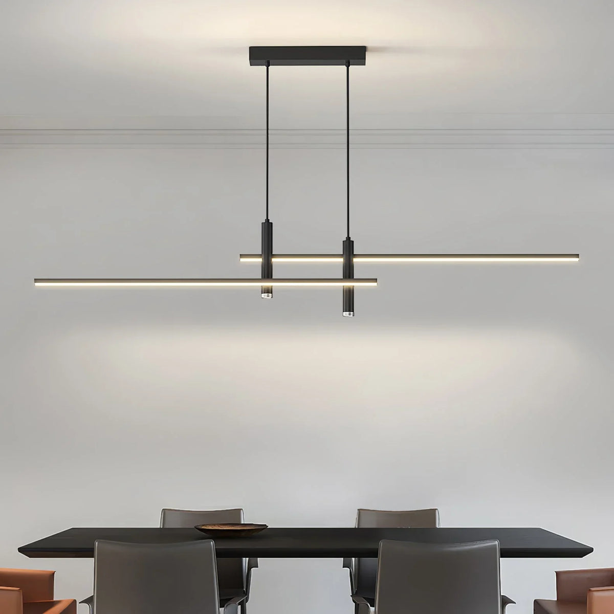 Linear LED pendant light in black and gold finishes