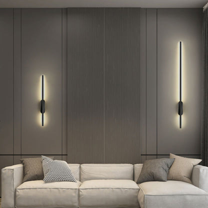 Pair of slim wall lights above a sofa