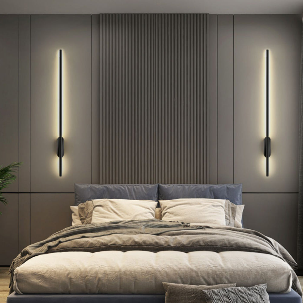 LED wall lights beside a bed