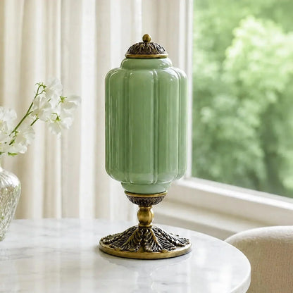 Green ribbed glass table lamp with decorative brass base
