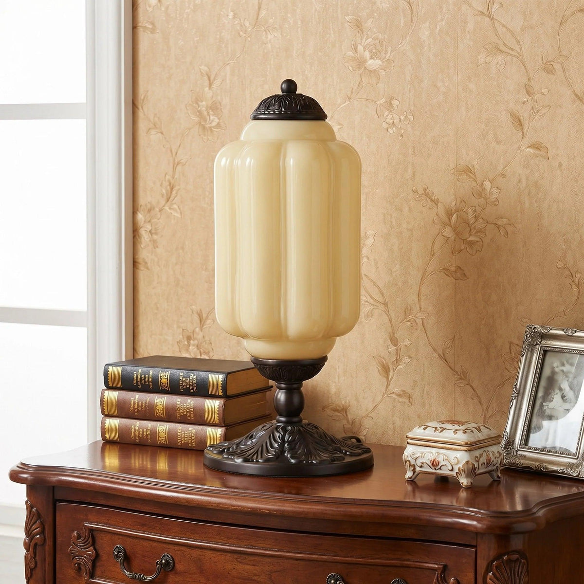 Yellow glass table lamp with black base