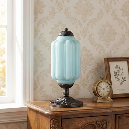 Blue glass table lamp with black base