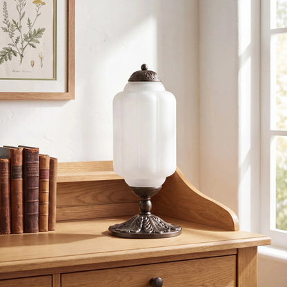 Frosted glass table lamp with black base