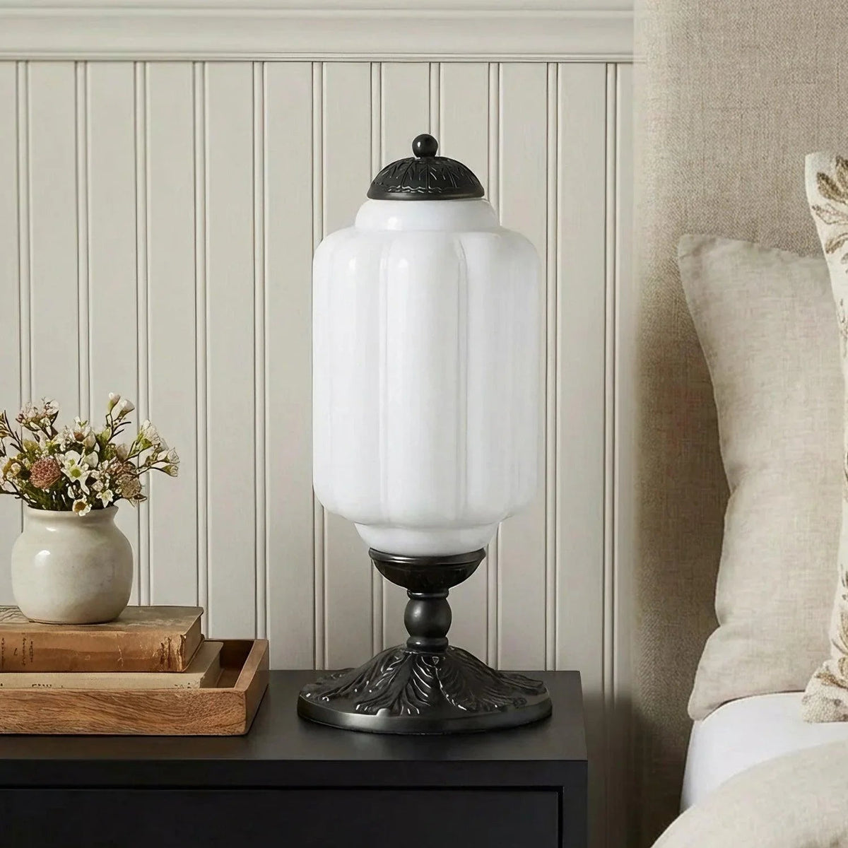 White ribbed glass table lamp with black base