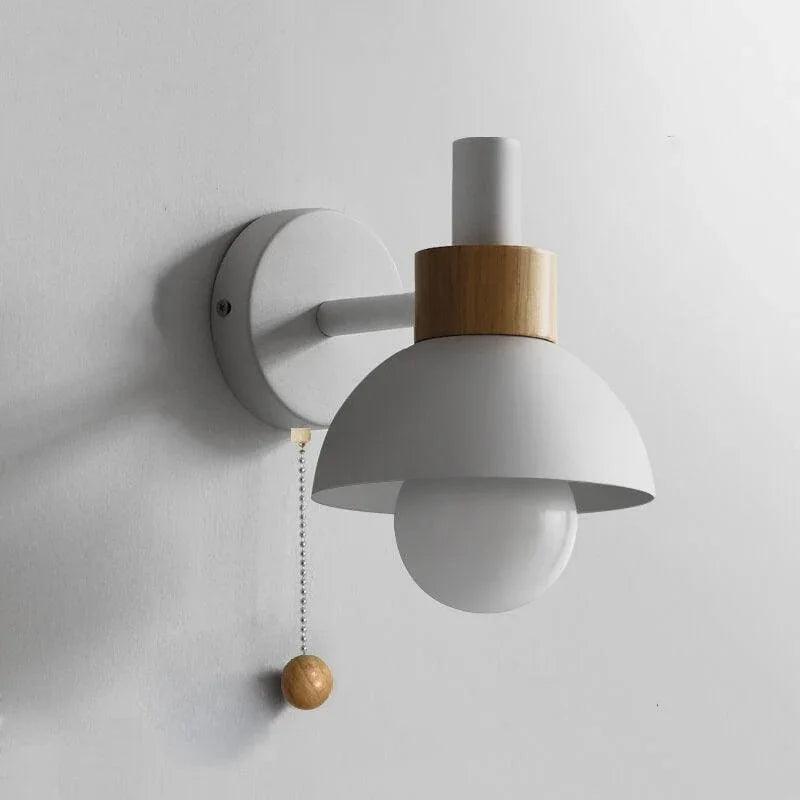 White globe wall light with round wall plate