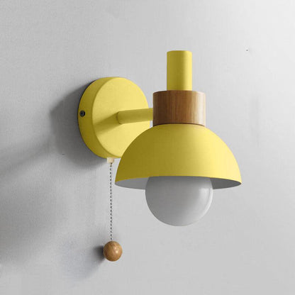 Lemon yellow Macaron globe wall light close-up