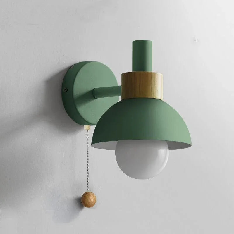 Green Macaron globe wall light close-up