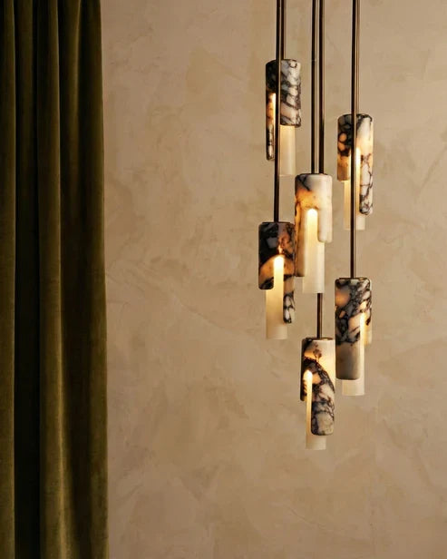 Grouped cylinder pendants at different heights