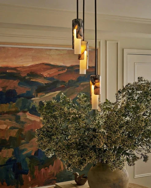 Cylinder pendant arrangement in a dining room