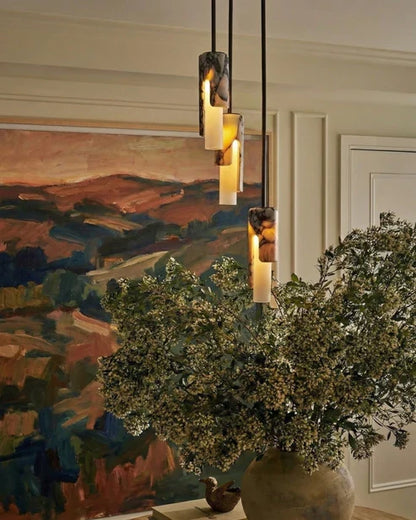 Cylinder pendant arrangement in a dining room