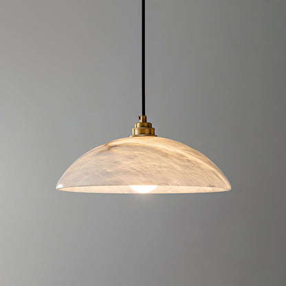 Illuminated marble dome pendant viewed from the side