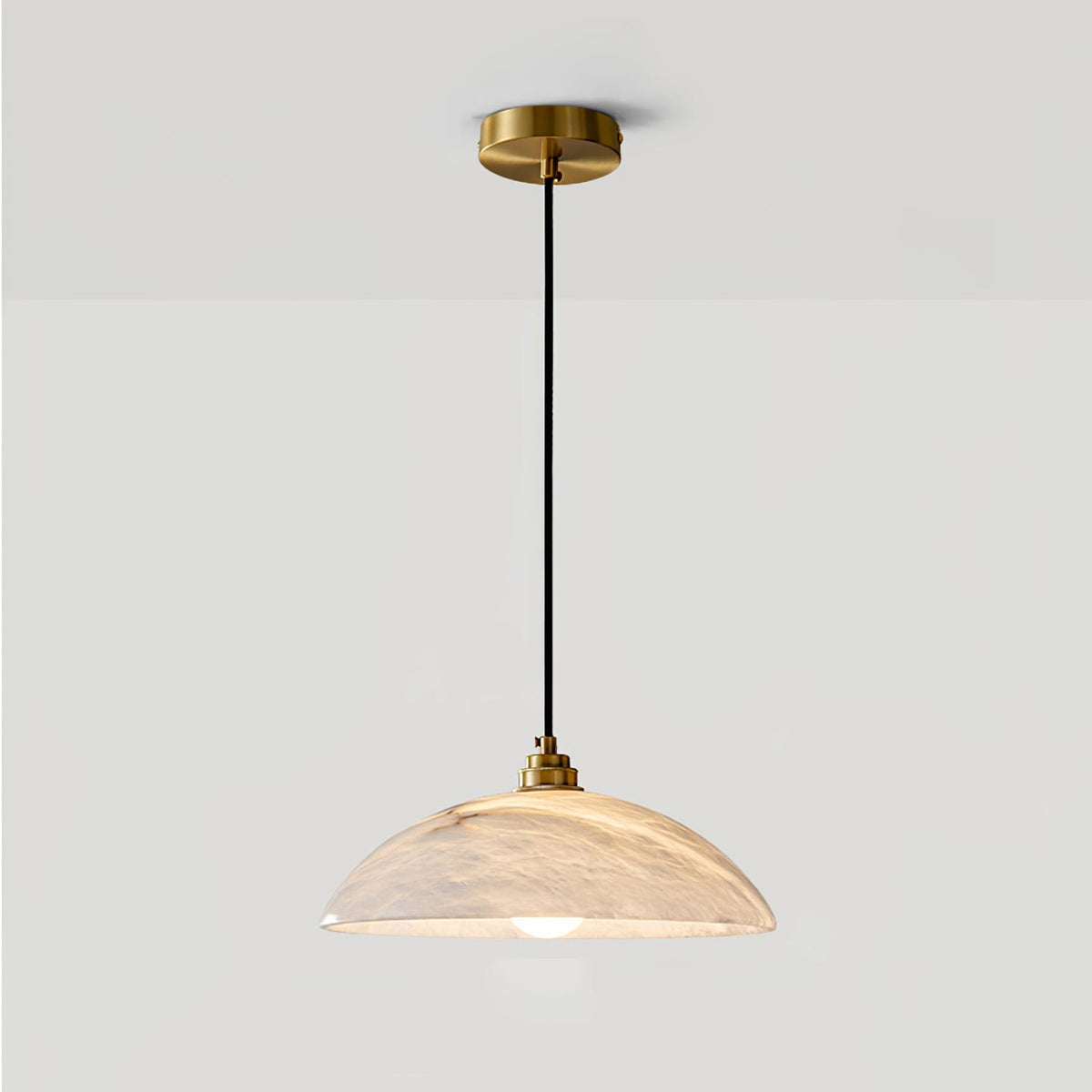 Marble pendant with dark suspension cable and canopy