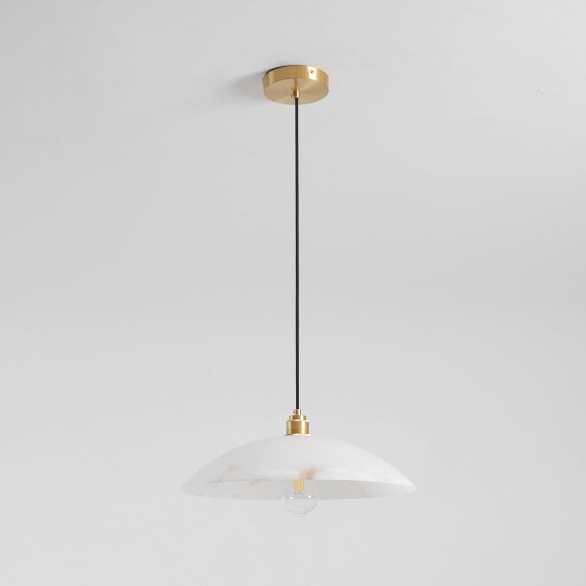 Marble dome pendant with canopy and dark suspension cable