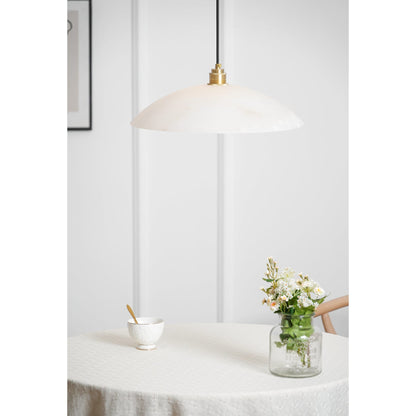Marble pendant above a table with flowers