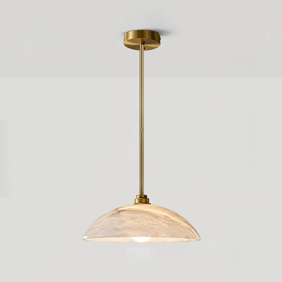 Illuminated marble dome pendant with metallic suspension rod