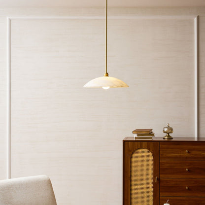 Marble pendant above a timber cabinet