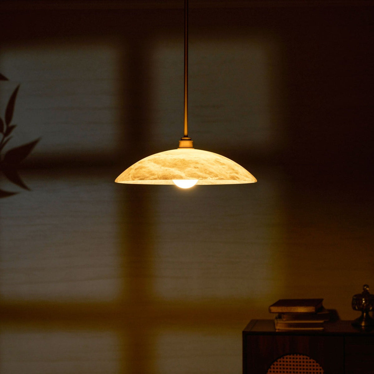 Close-up of illuminated marble patterns in a darkened room
