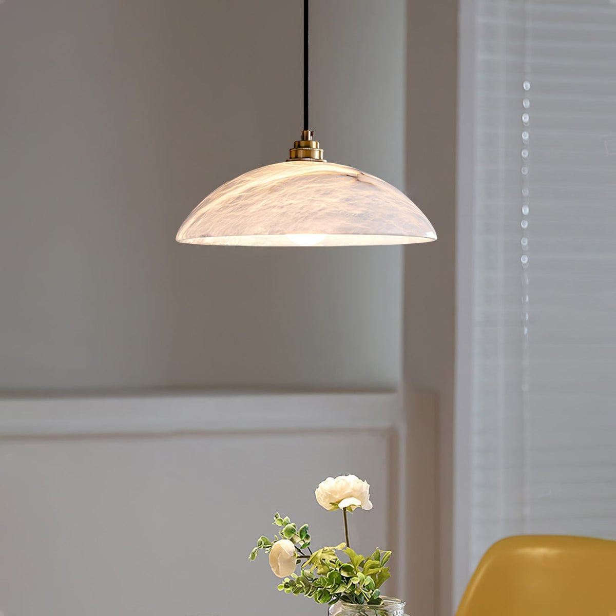 Illuminated marble shade near a window