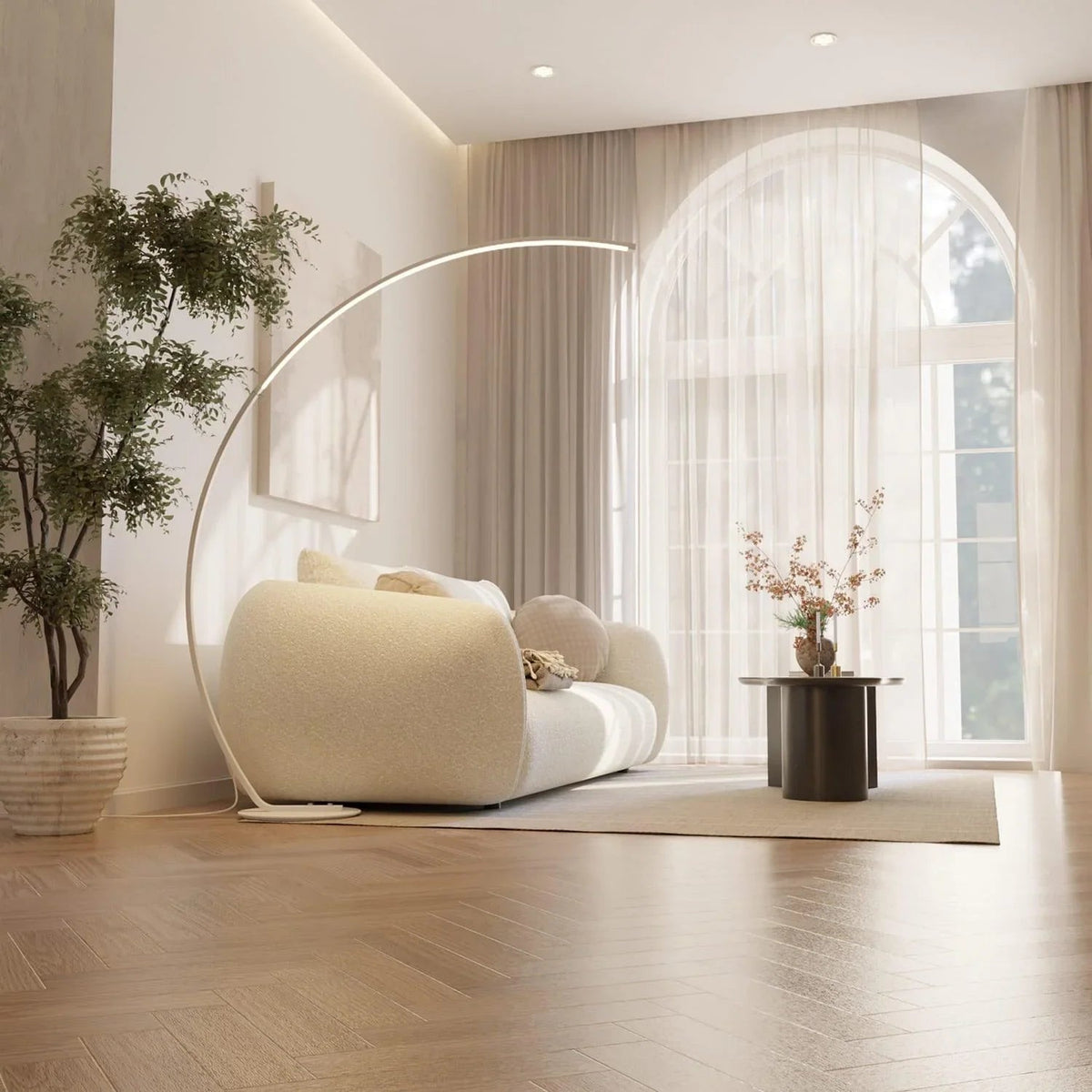 White arc floor lamp over a cream sofa