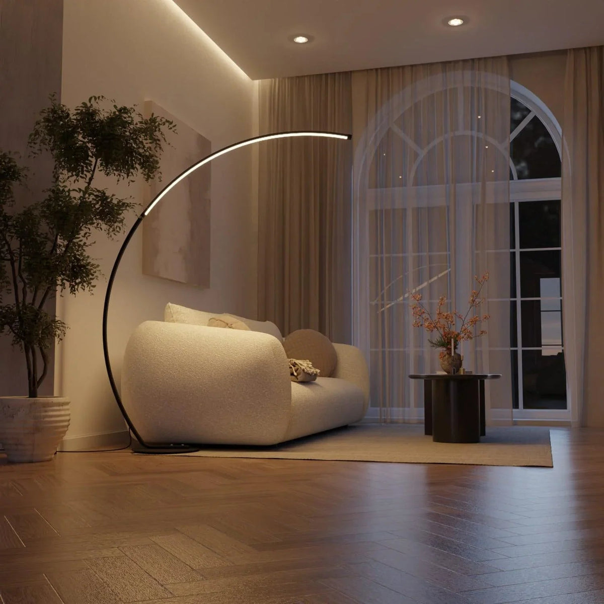 Black arc floor lamp illuminating a living room at night