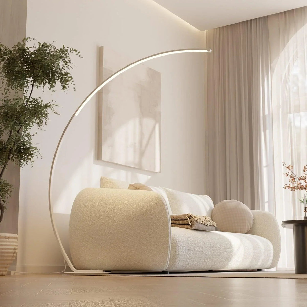 White arc LED floor lamp extending over a sofa