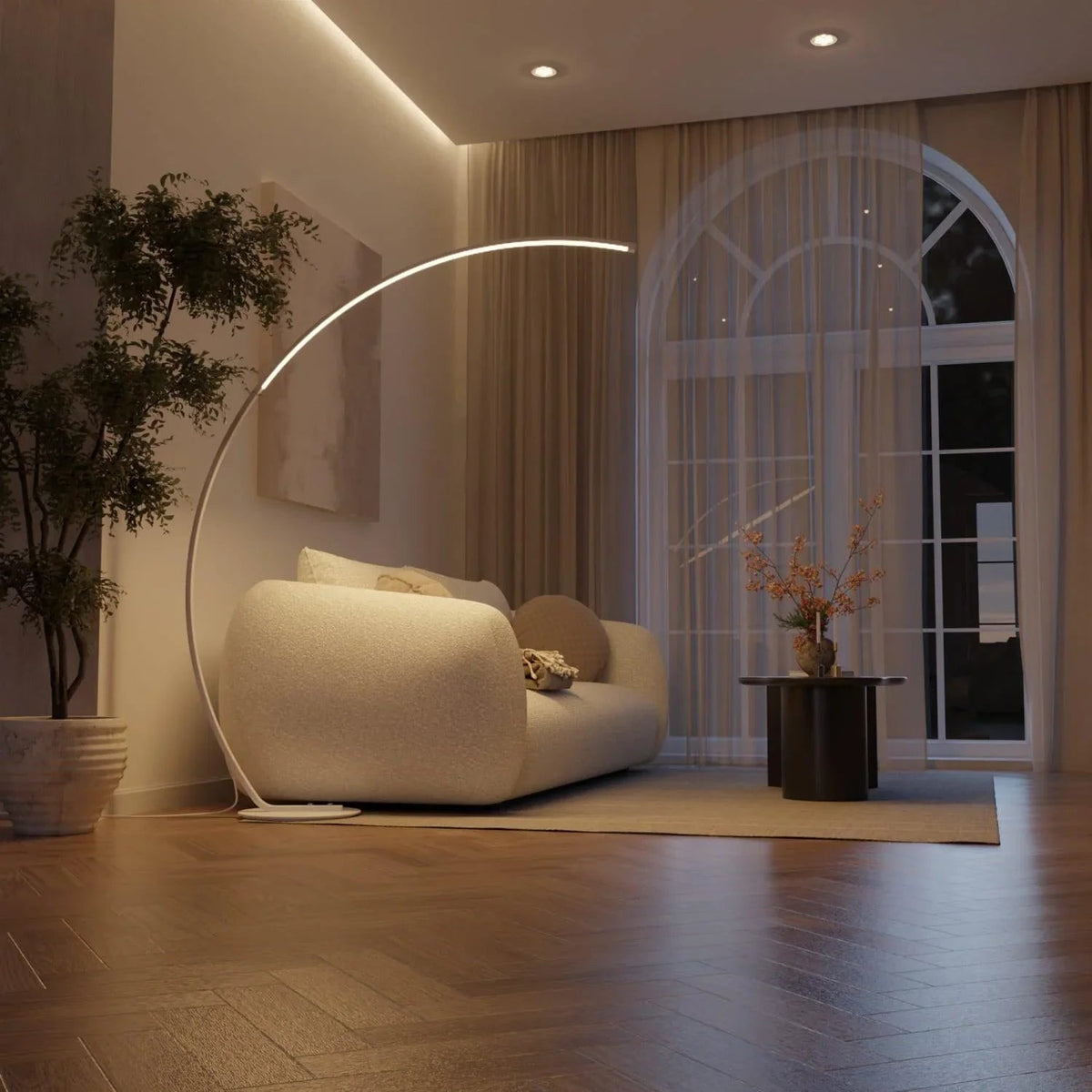 White arc floor lamp illuminating a living room at night
