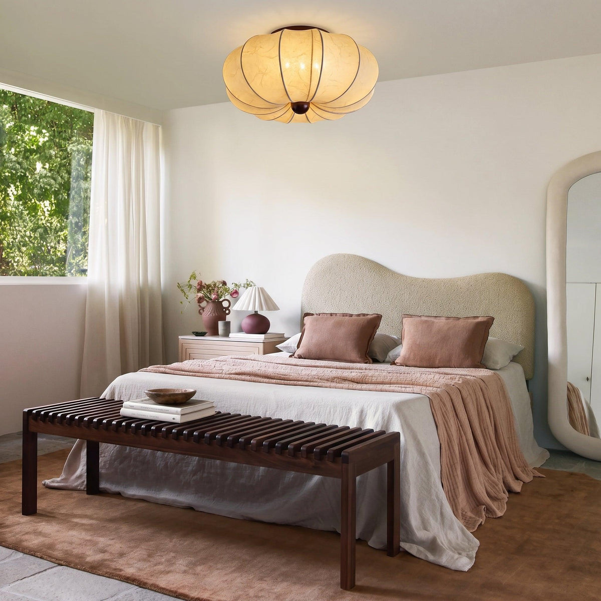 Silk ceiling light above a bedroom