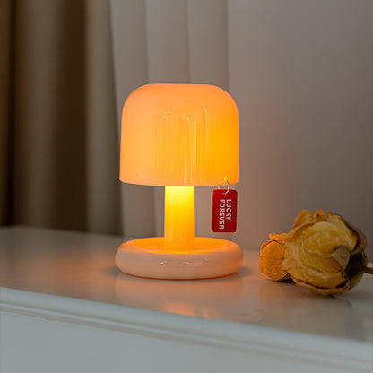 Mini mushroom table lamp with rounded base and warm LED glow 18