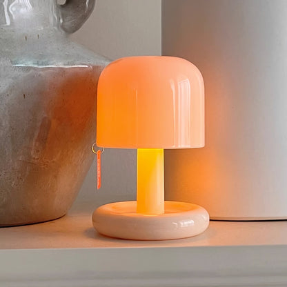 Mini mushroom table lamp with rounded base and warm LED glow 24