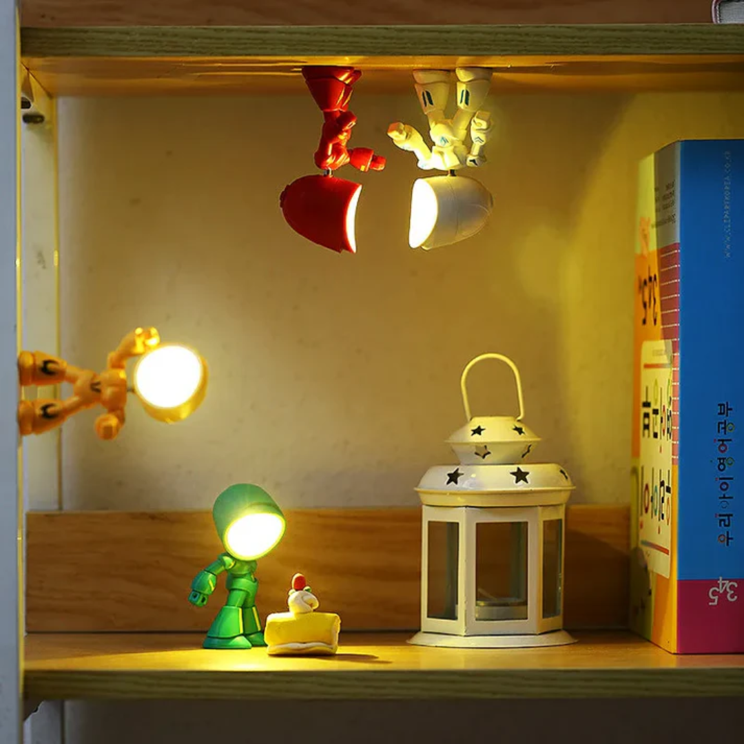 Robot LED table lamps arranged on a shelf