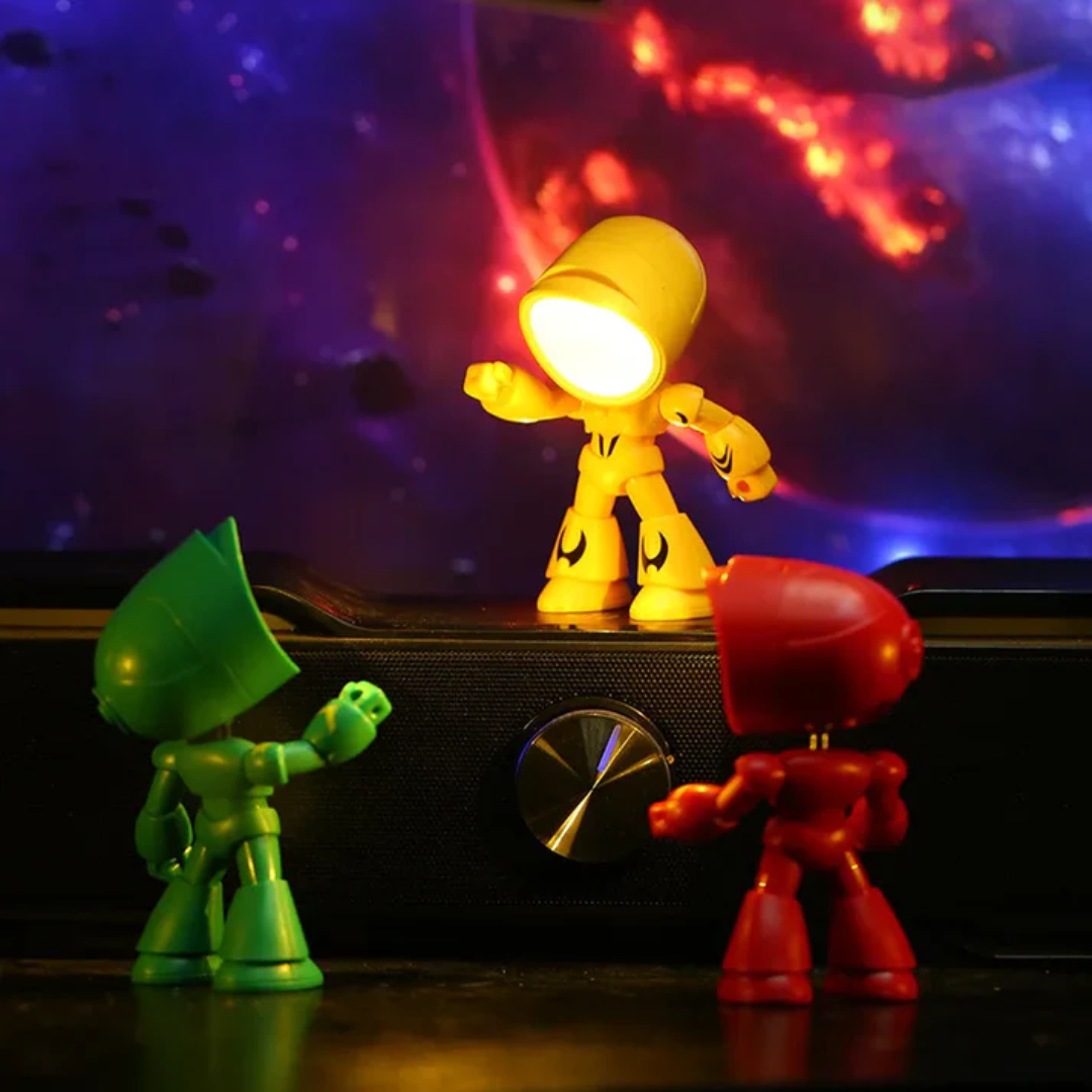 Robot lamps with warm LED heads on a gaming desk