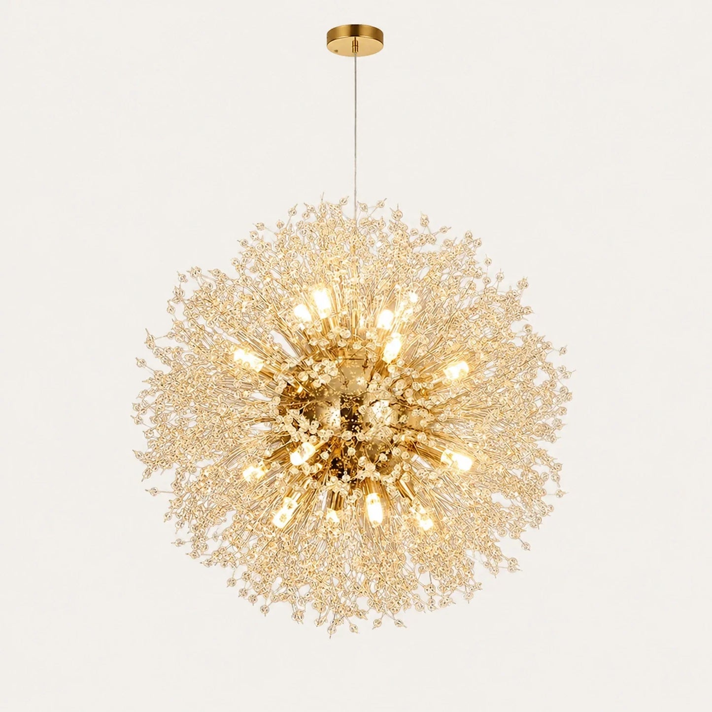 A spherical modern dandelion LED pendant light with a gold finish, featuring delicate radiating branches tipped with glowing lights against a plain backgro