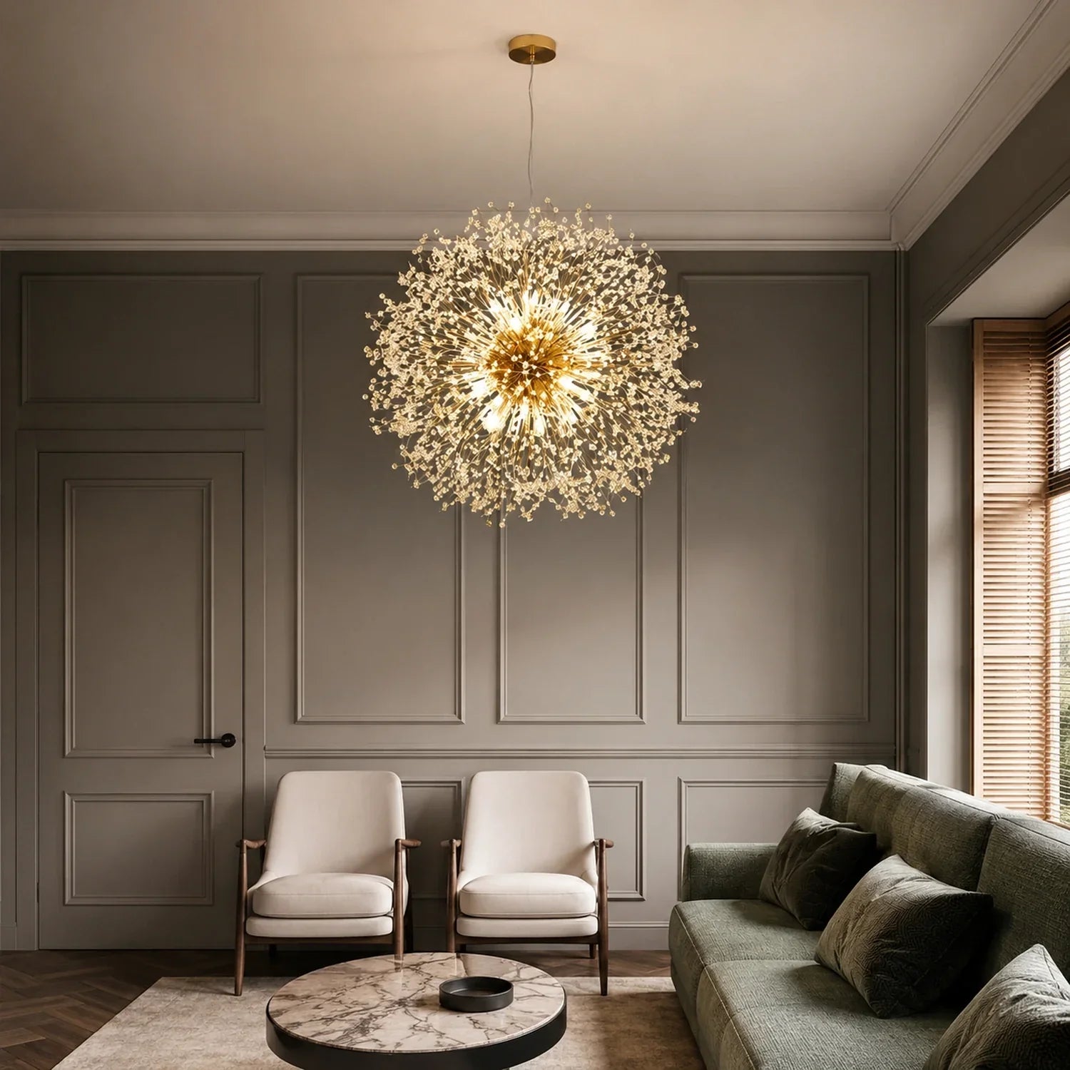 Modern dandelion LED pendant light with a gold finish hanging in a sophisticated living room with grey panelled walls and contemporary furniture.