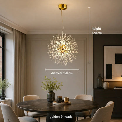 Modern golden dandelion pendant light with 9 heads, 50cm diameter and 120cm height, illuminating a contemporary dining room with a marble table.