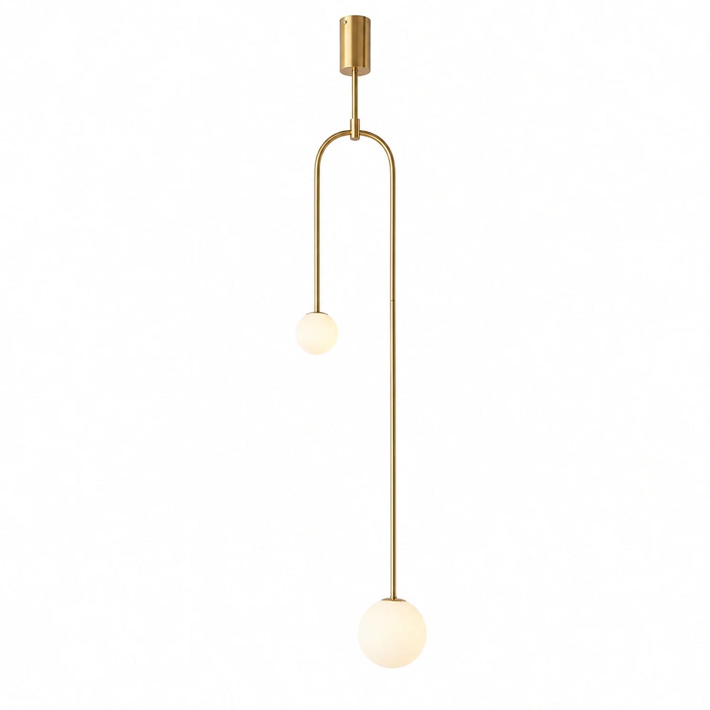Modern double globe pendant light featuring a sleek gold-tone frame with two offset white glass spheres suspended at different heights for minimalist decor
